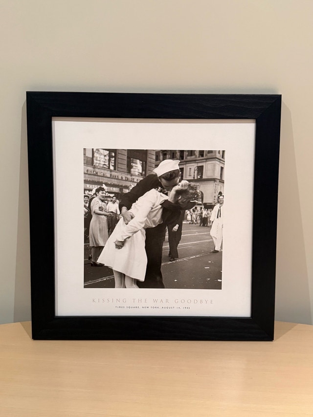 Kissing the War Goodbye Framed Photo