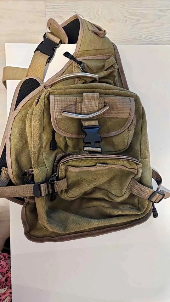 Olive green canvas sling bag