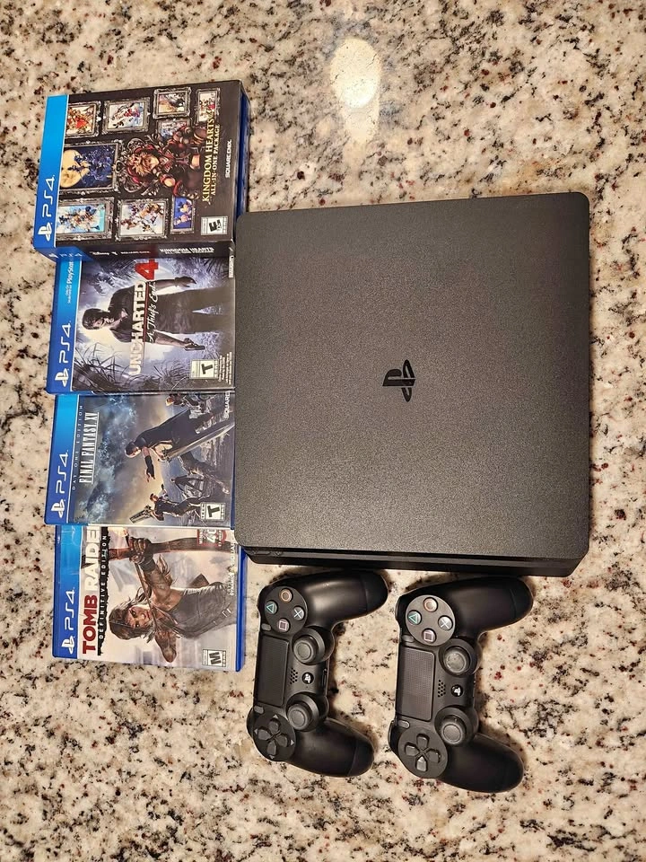 PS4 Slim 1TB Bundle – Perfect Condition (2 Controllers + 4 Games