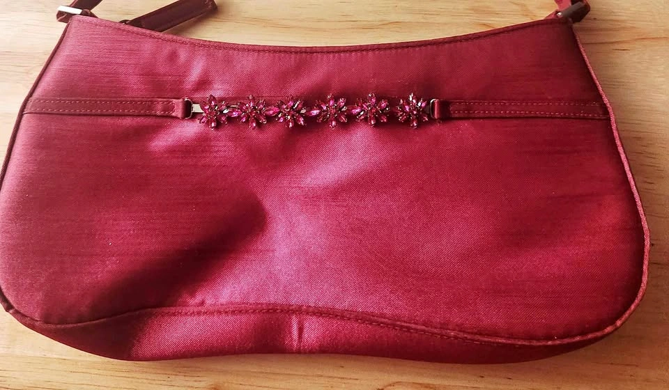 Pink handbag with rhinestone detail