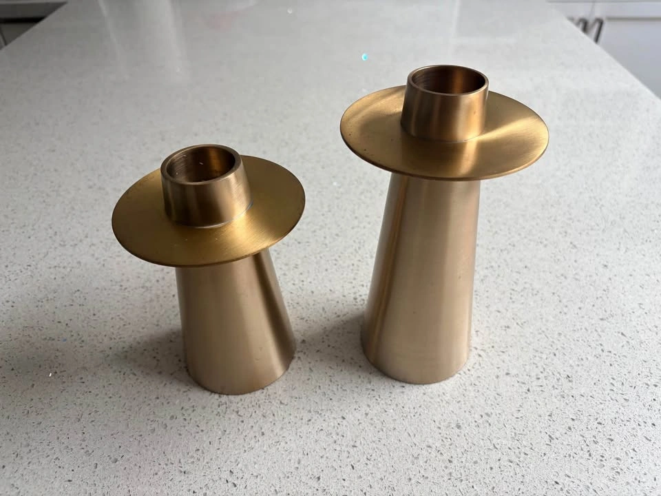 A pair of candle holders