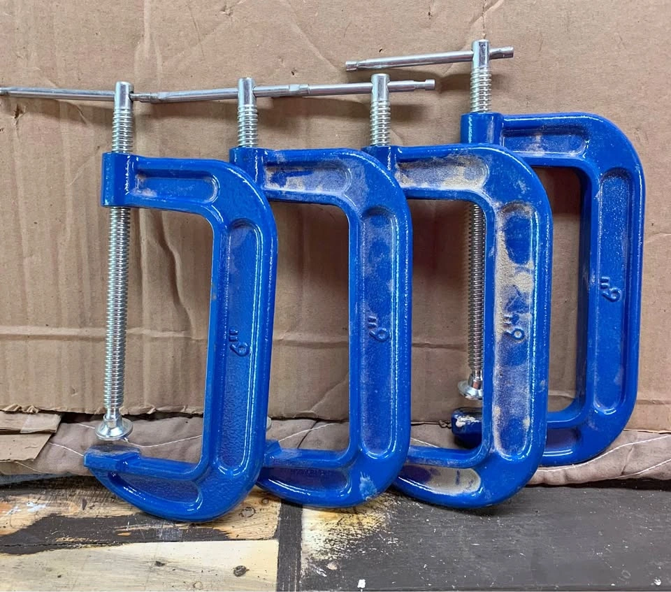 Four 6 inch C-clamps