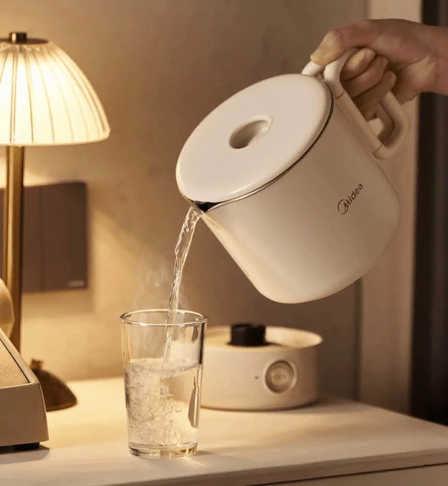 Midea 0.7L Portable Foldable Electric Kettle - photo 5