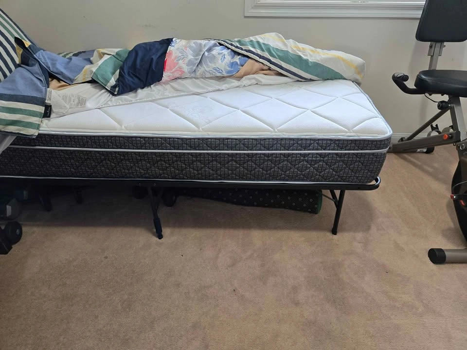 Twin XL size mattress on metal frame - photo 2