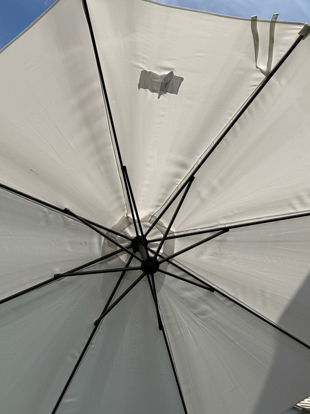 Outdoor cantilever patio umbrella with weights - photo 5