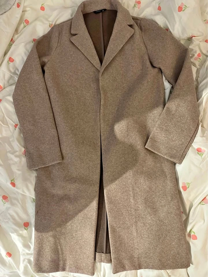 Woman’s brown wool long coat