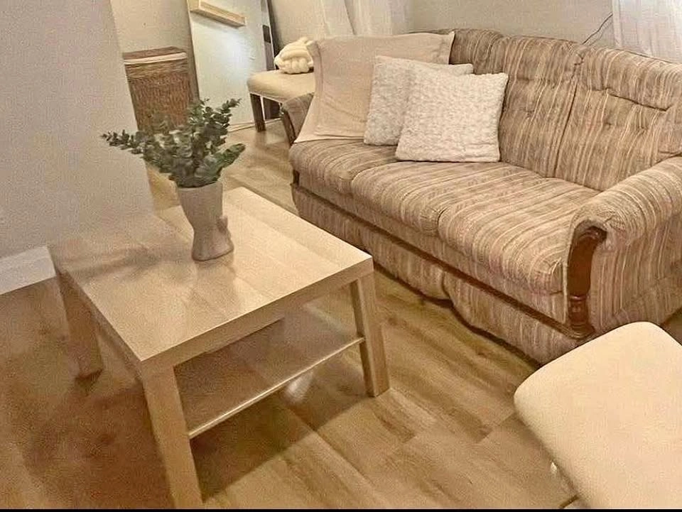 Comfy striped sofa and IKEA LACK coffee table