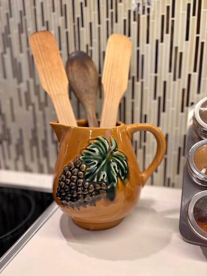 Vintage-style Ceramic Pitcher with Grape Design Utensil Holder