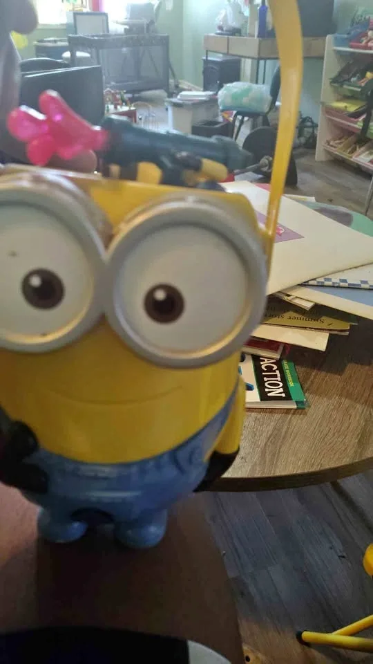 A bunch of minions with a basket