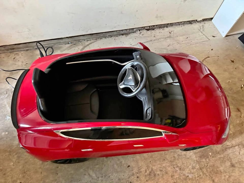 Original Tesla licensed ride-on electric car (not a knockoff)
