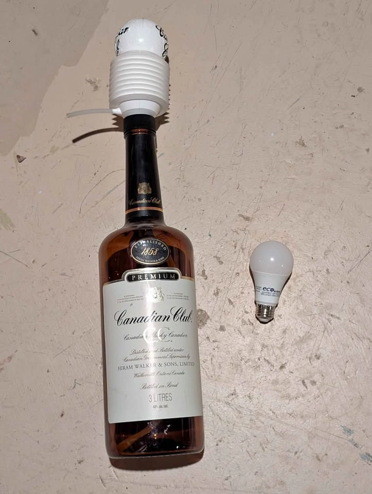 Huge Canadian club bottle with pump