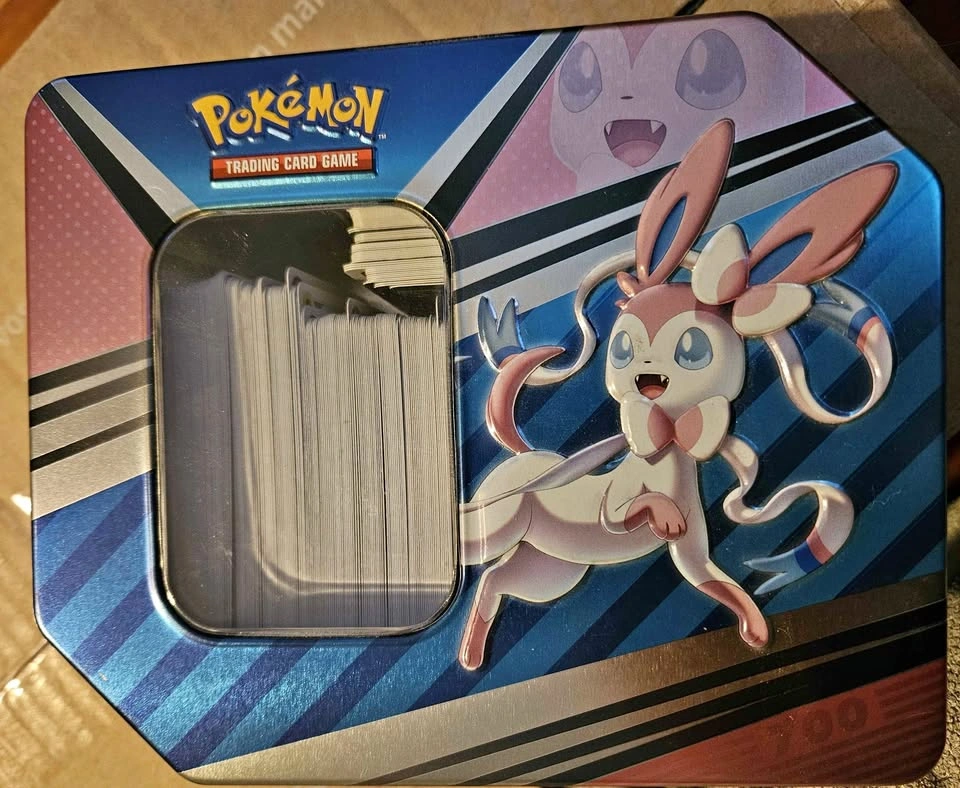 Pokemon Sylveon Tin and Digimon Trading Cards