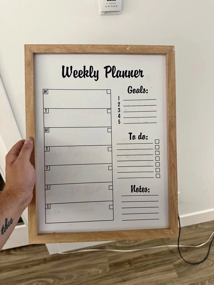 Weekly planner sign