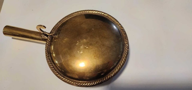 Vintage brass silent butler crumb catcher with decorative rope