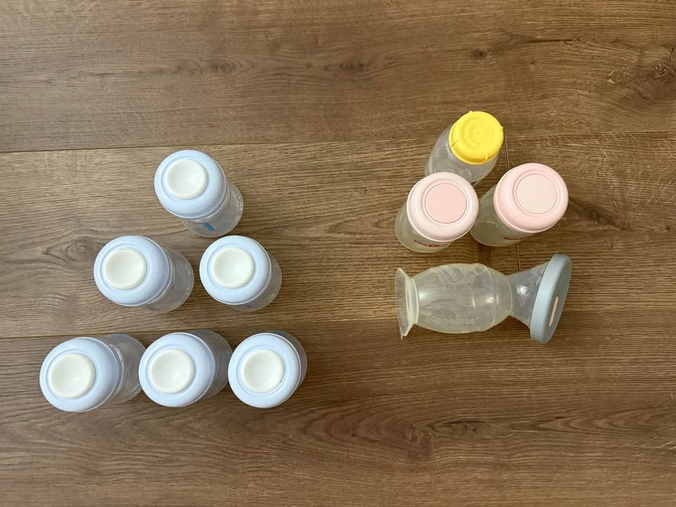 Bunch of baby bottles - photo 2