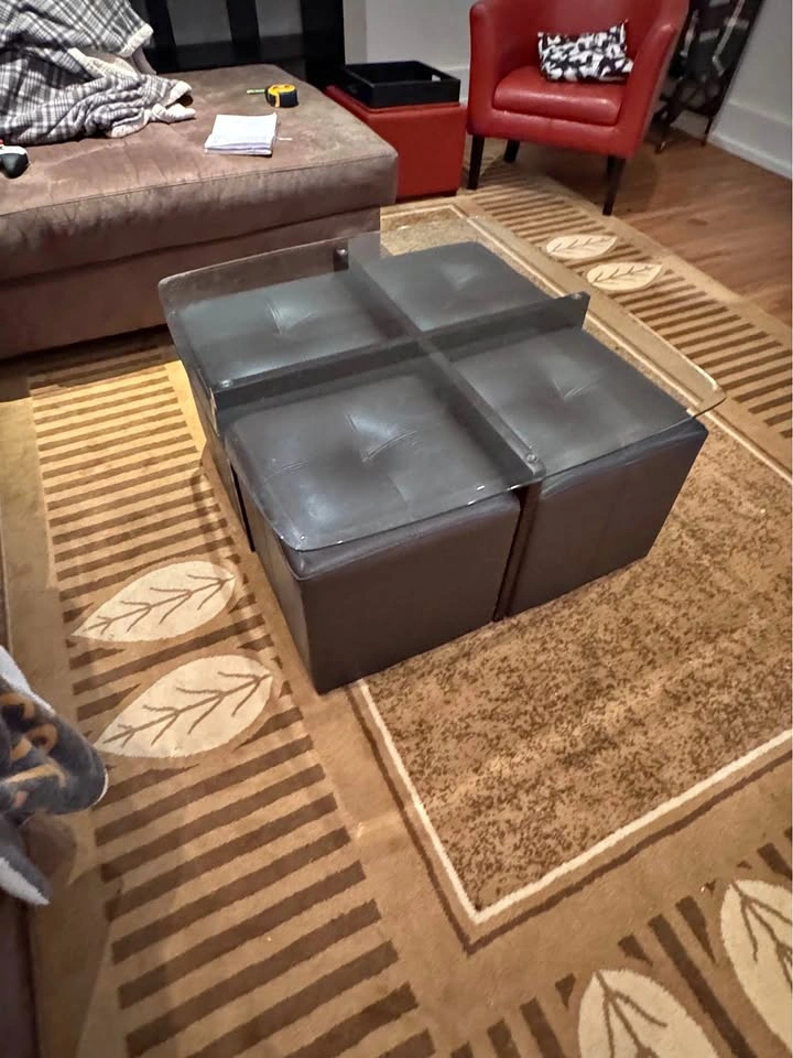 Glass Coffee Table with Brown Ottomans