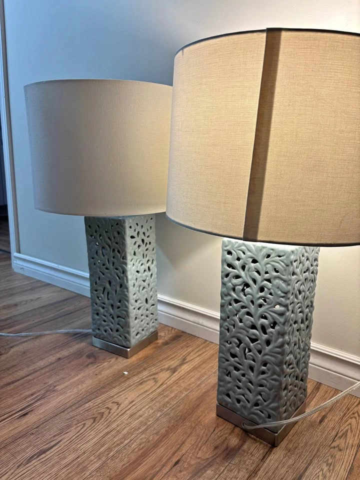 Two light blue lamps with motif