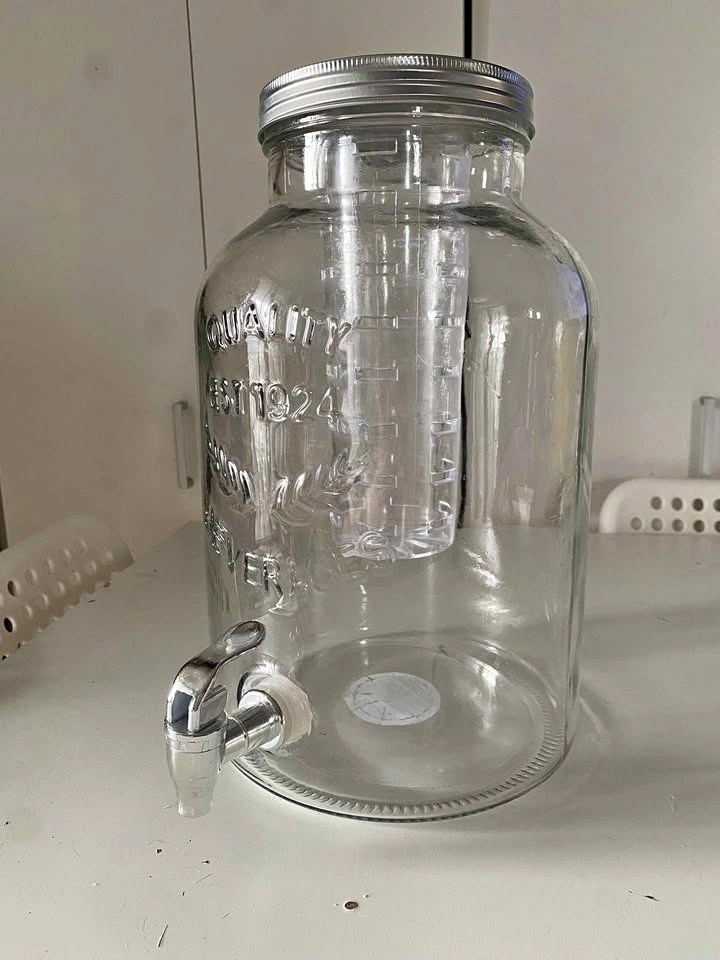 Glass Beverage Dispenser with Spigot and Ice Core