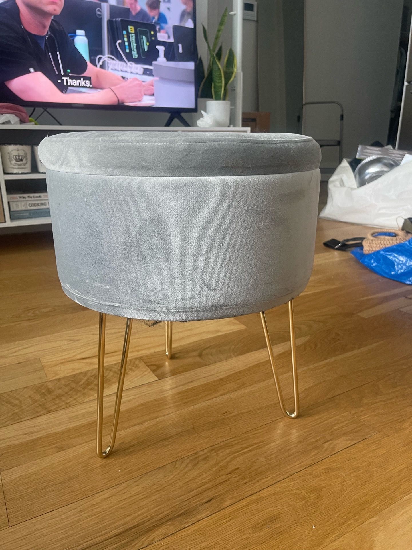 Circular velvet blue side ottoman with storage