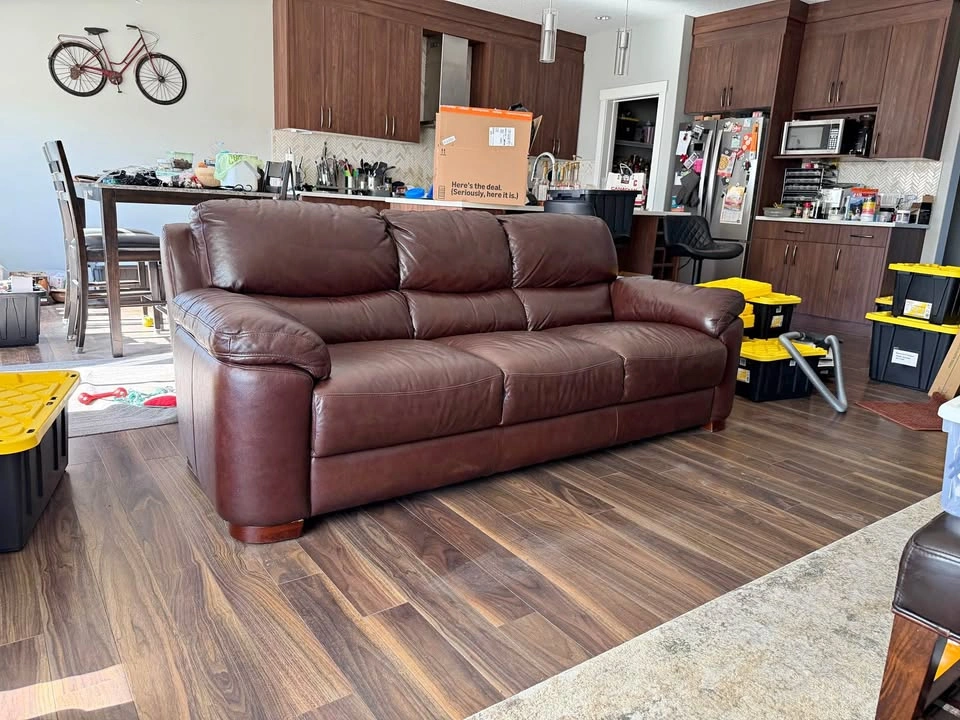 Large leather couch new condition