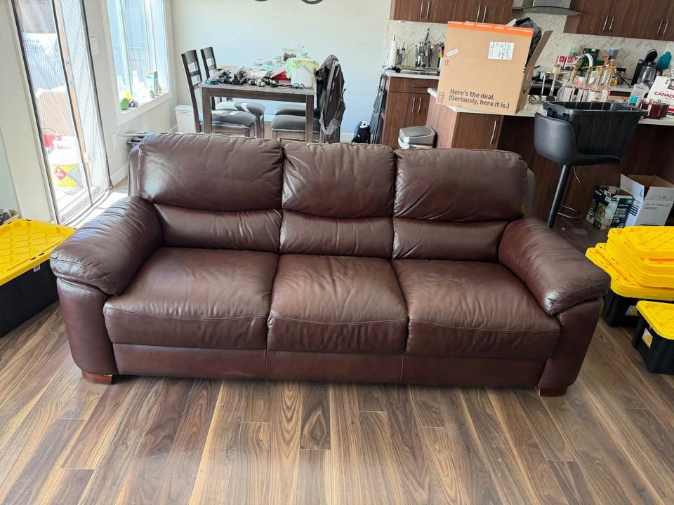Large leather couch new condition - photo 2
