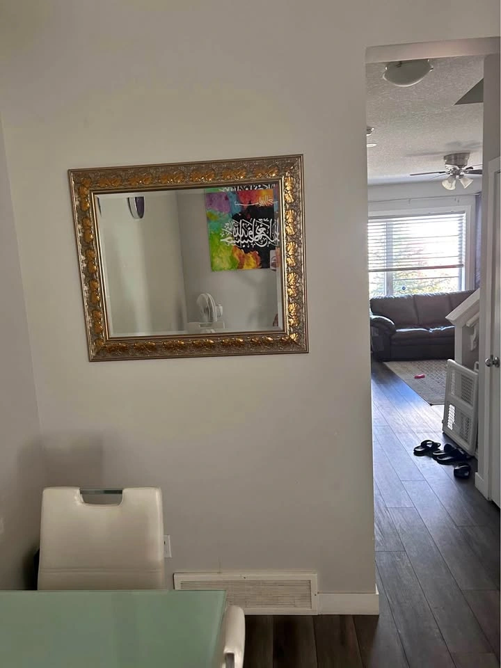 Gold frame wall mirror