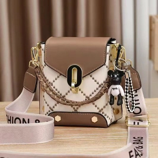 Crossbody Bag with Braided Handle and Teddy Bear Charm - photo 5