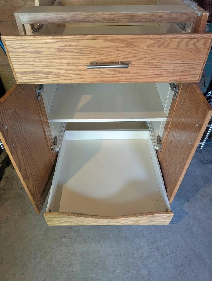 Lower oak cabinet with pullout drawers