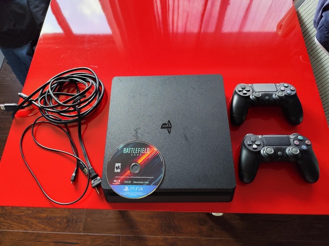 (Delivery) PS4 1TB w/games