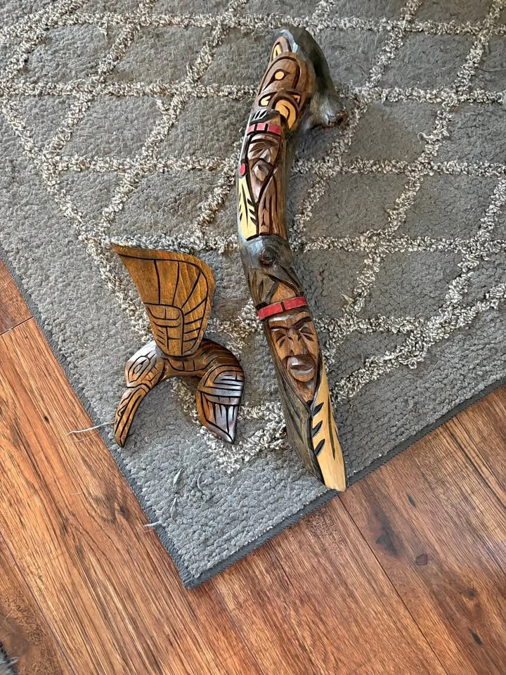 Hand carved wooden totem, signed by Graham Smith, 1993