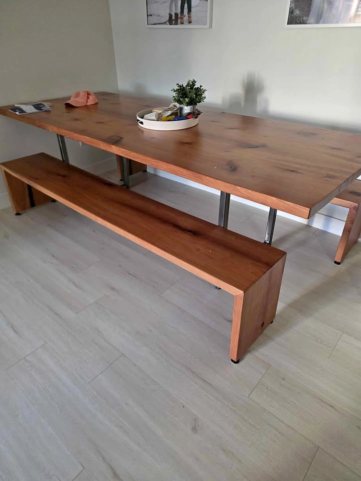 Custom wood dining table with benches