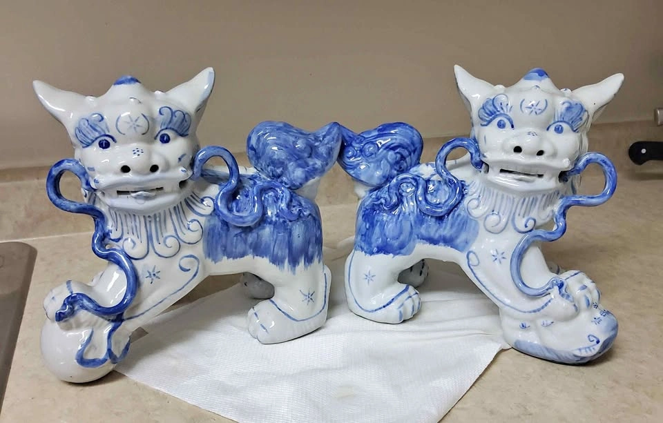 Cool blue n white Foo Dog statues
