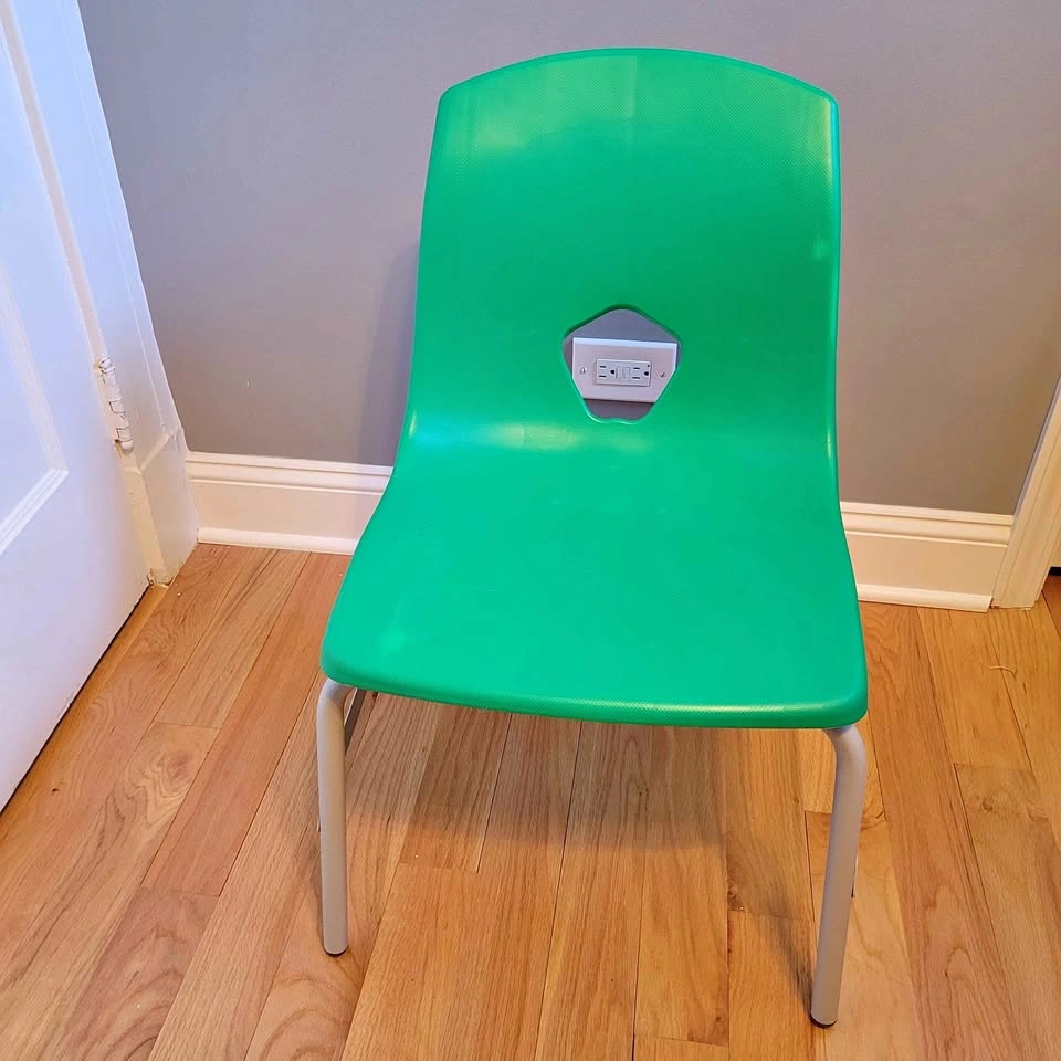 Solid green school chair