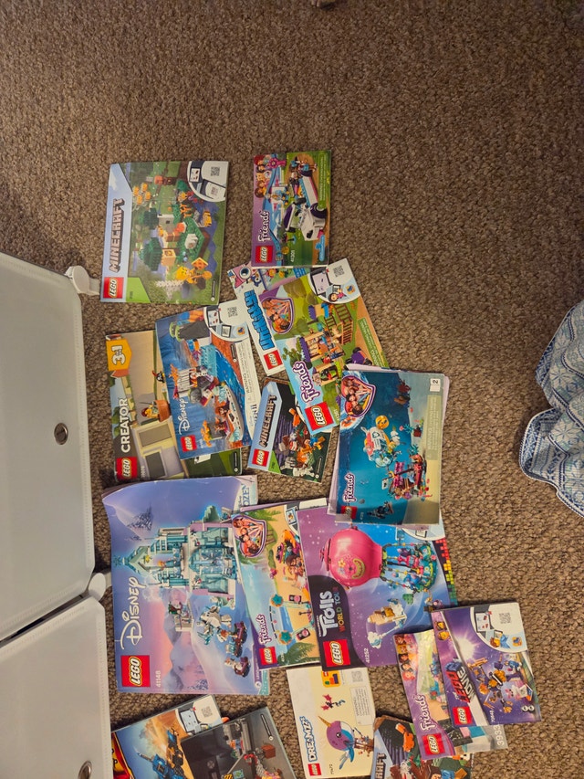 Buckets of Lego and manuals