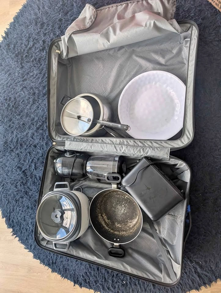 Suitcase with utensils