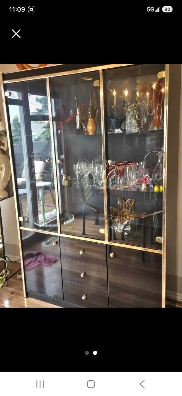 Elegant China Cabinet Featuring Glass Doors & Interior Light