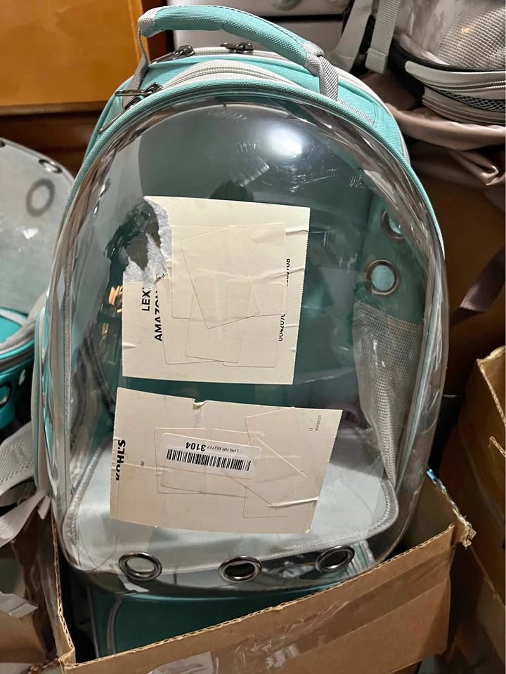 Teal pet carrier backpack clear bubble
