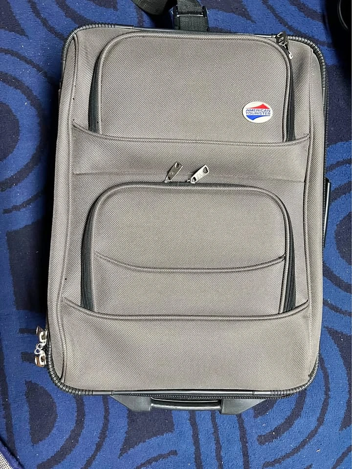 American Tourister 20” Softside Carry-On Rolling Suitcase