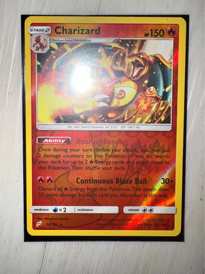 Charizard reverse holo from team up
