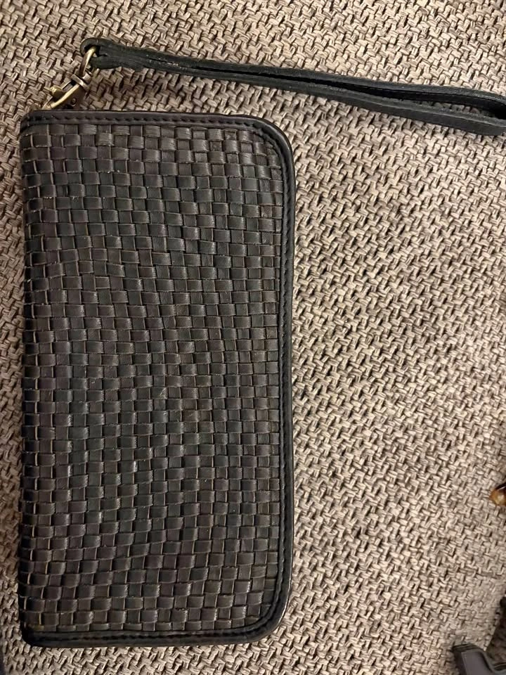 Black woven leather wallet clutch with wristlet strap