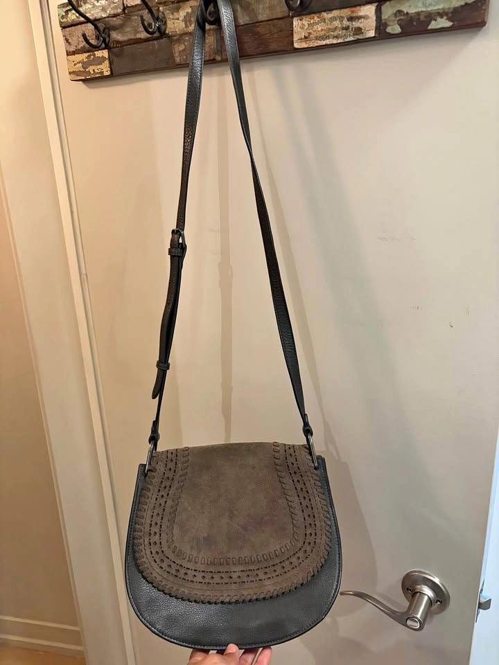 Dark gray crossbody bag with suede-like flap