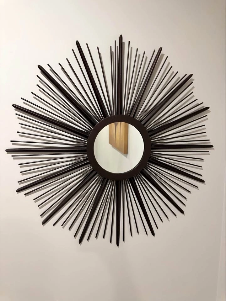 Dark brown sunburst mirror