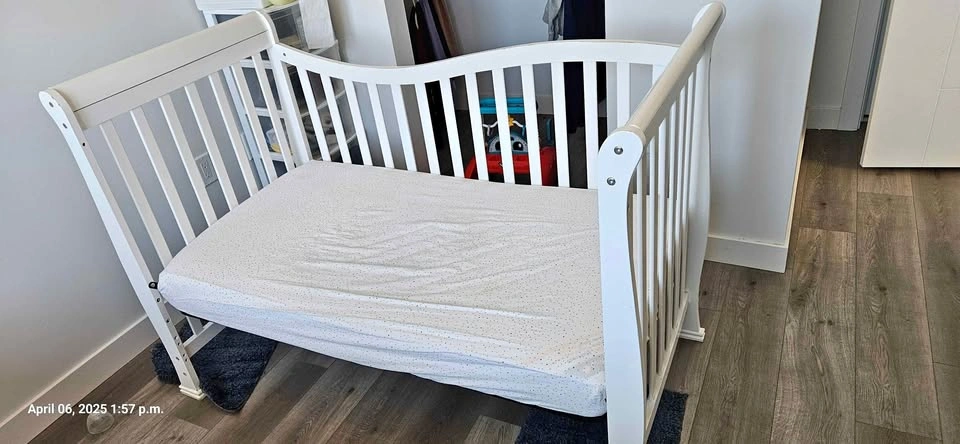 Baby crib with mattress from pet free and smoke free home