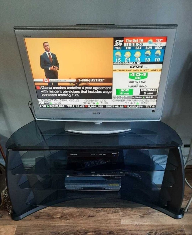 Glass TV Stand with Sony T.V. - photo 4