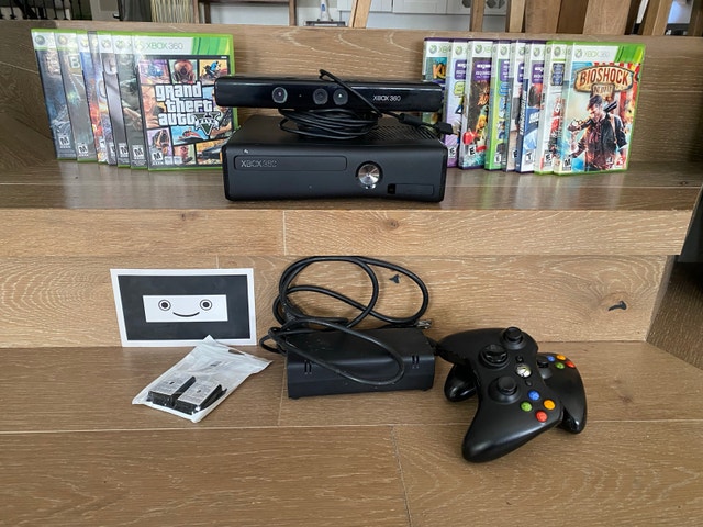 Xbox 360 slim bundle w Kinect and two original controllers