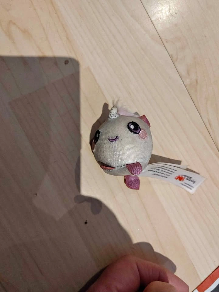 Squeezamals Uma the unicorn plush. Fair condition.