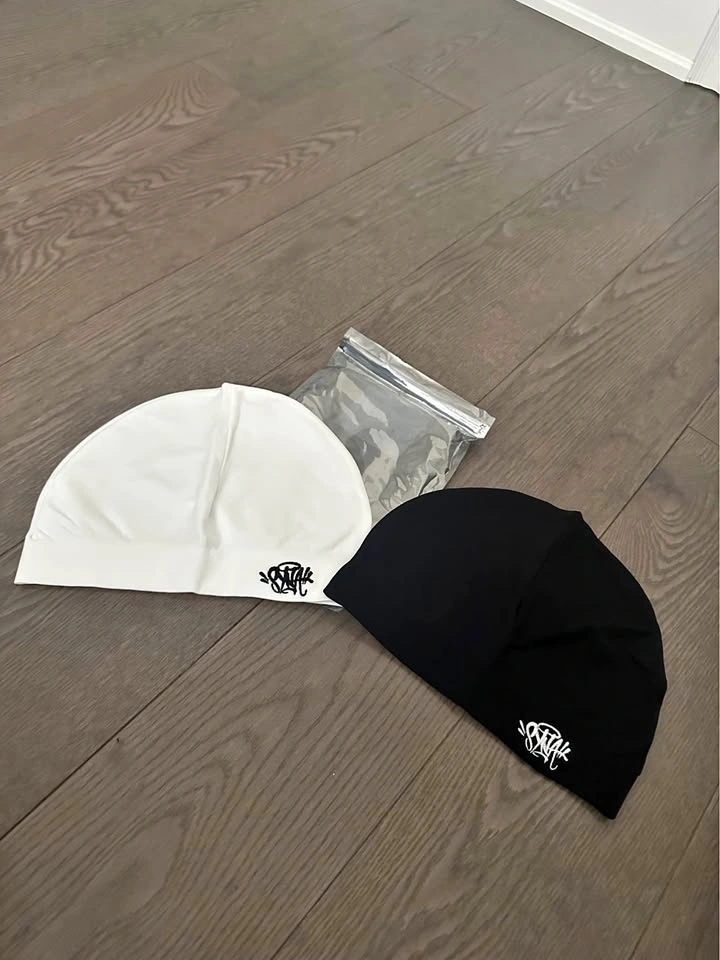 Syna skull caps