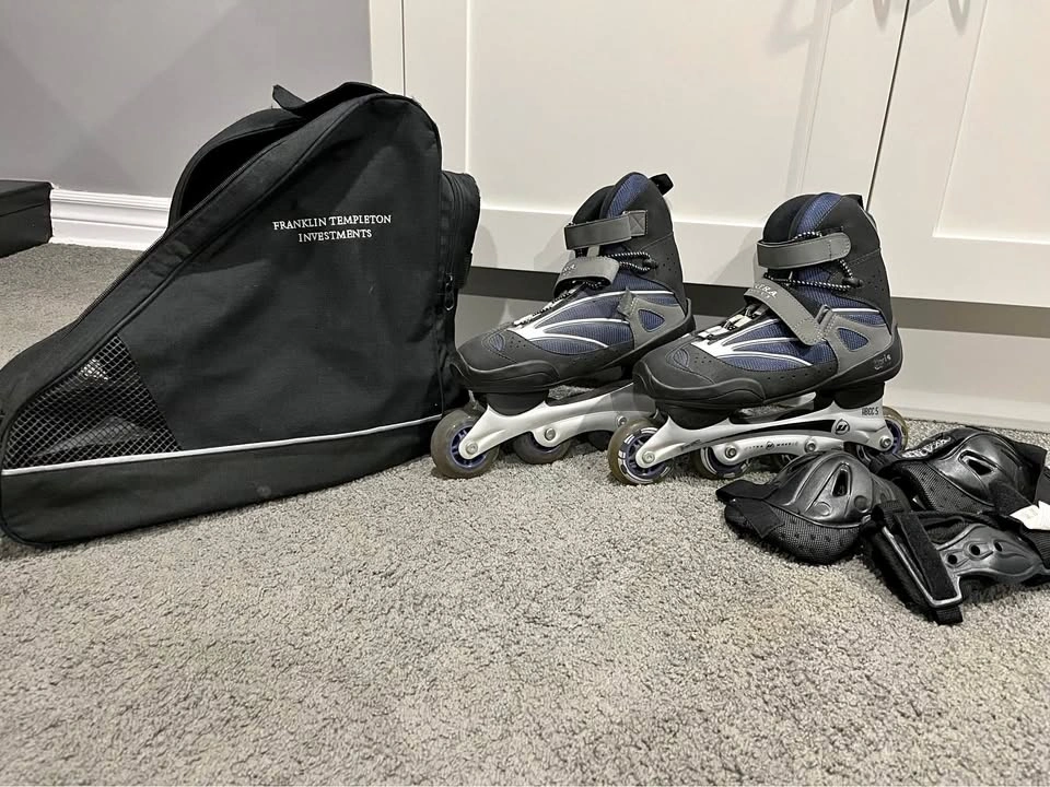 Men’s Size 9 Rollerblades, with knee pads and Case