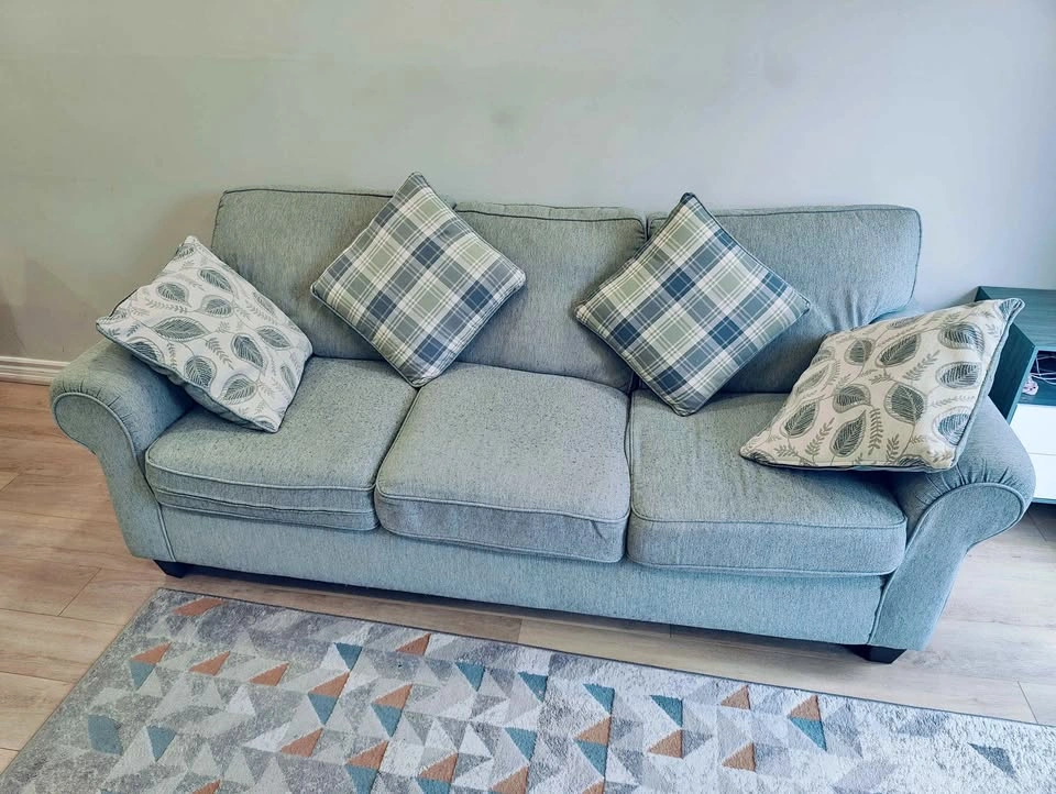 3 seater turquoise color sofa with 4 cushions