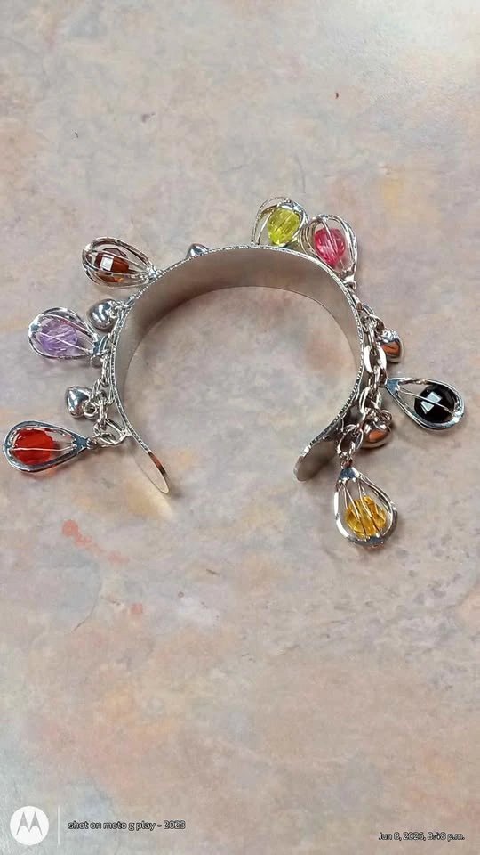 Silver Tone Cuff Bracelet With Charms